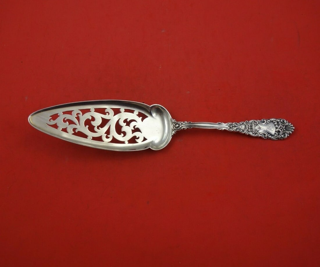 Dominick and Haff Renaissance Sterling Silver Pierced Cake Server 9 7/8": Dominick and Haff Renaissance Sterling Silver Pierced Cake Server 9 7/8" A Renaissance pattern jelly cake server by Dominick & Haff, made of sterling silver and measuring 9 7/8 inches. The piece is pi
