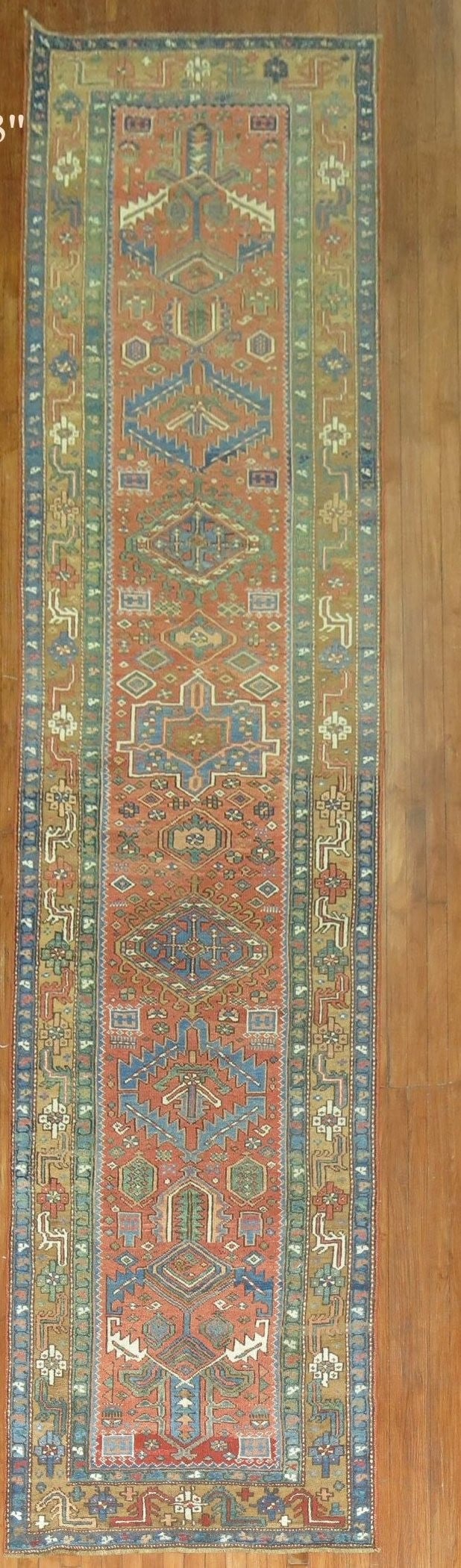 3' 6" x 14' 3" Early 20th Century Persian Serapi Heriz Rug Runner: 3' 6" x 14' 3" Early 20th Century Persian Serapi Heriz Rug Runner An early 20th century tribal Persian Heriz runner with the classic character associated with Serapi/Heriz weaving. This pre-owned rug 