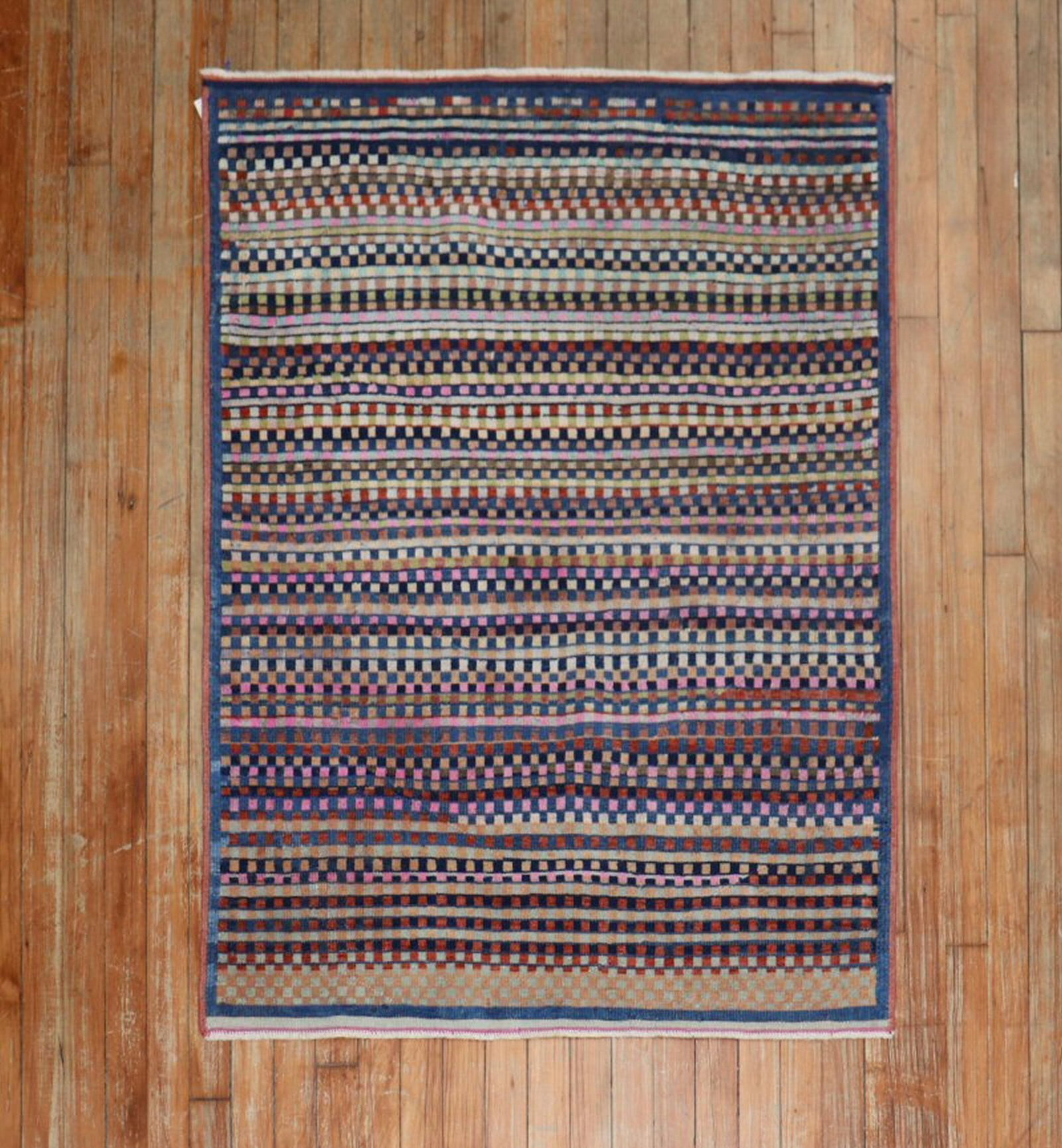3' 2" x 4' 5" Mid 20th Century Turkish Deco Scatter Rug: 3' 2" x 4' 5" Mid 20th Century Turkish Deco Scatter Rug Mid-20th century Turkish Deco scatter rug with a distinctive funky design. This pre-owned small rug offers a compact format suited to a variety 