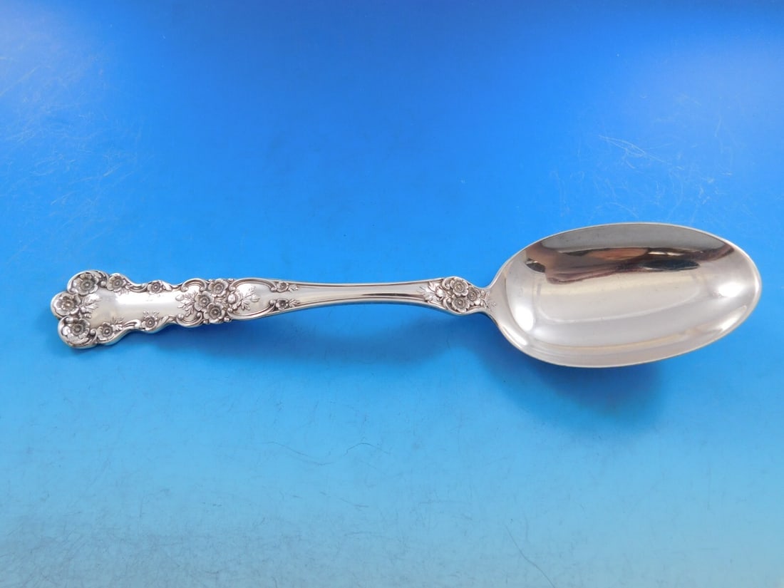 Gorham Buttercup Sterling Silver Serving Spoon Antique 8 3/8 Inches: Gorham Buttercup Sterling Silver Serving Spoon Antique 8 3/8 Inches Discover the elegance of the Buttercup pattern by Gorham with this exquisite sterling silver serving spoon. Measuring 8 3/8 inches, 