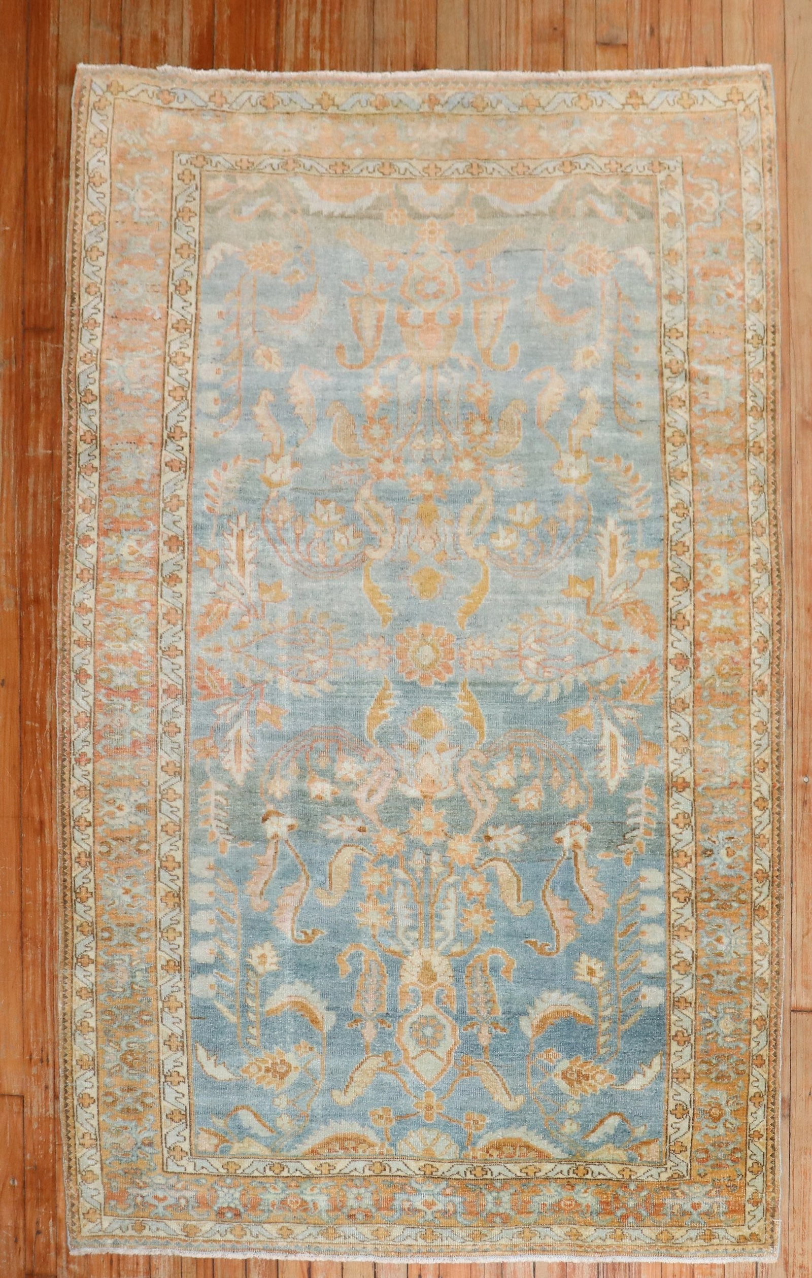 1920s Persian Sarouk Accent Rug 4' 3" x 6' 7" Sky Blue Field: 1920s Persian Sarouk Accent Rug 4' 3" x 6' 7" Sky Blue Field A 1920s Persian Sarouk accent rug featuring a sky blue field with peach accents. This pre-owned rug offers the classic character and decora