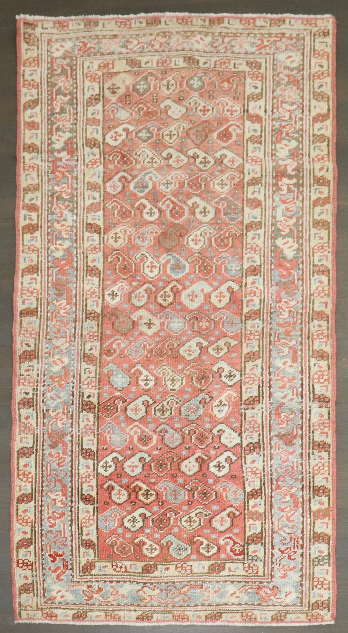 2' 11" x 5' 4" Small Persian Serapi Heriz Scatter Rug: 2' 11" x 5' 4" Small Persian Serapi Heriz Scatter Rug Early 20th century Persian Heriz scatter-size rug with an all-over small paisley pattern. This pre-owned rug is identified as Serapi/Heriz. Specif