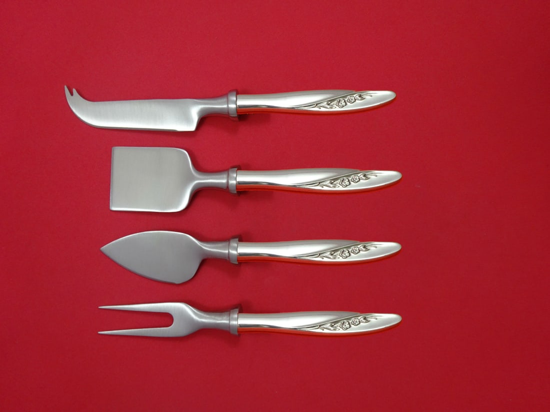 Gorham Blithe Spirit Sterling Silver Cheese Serving Set 4 Piece: Gorham Blithe Spirit Sterling Silver Cheese Serving Set 4 Piece Introducing the elegant Blithe Spirit Cheese Serving Set by Gorham, crafted from high-quality sterling silver. This exquisite 4-piece ho