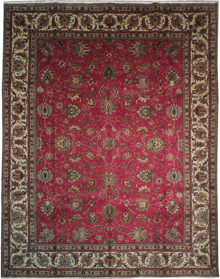 1980s 9'10 x 12'4 Persian Tabriz Hand-Knotted Area Rug: 1980s 9'10 x 12'4 Persian Tabriz Hand-Knotted Area Rug Free continental US Shipping Elevate your home decor with this stunning vintage Persian Tabriz Rug from the 1980s. Handcrafted in the prestigious