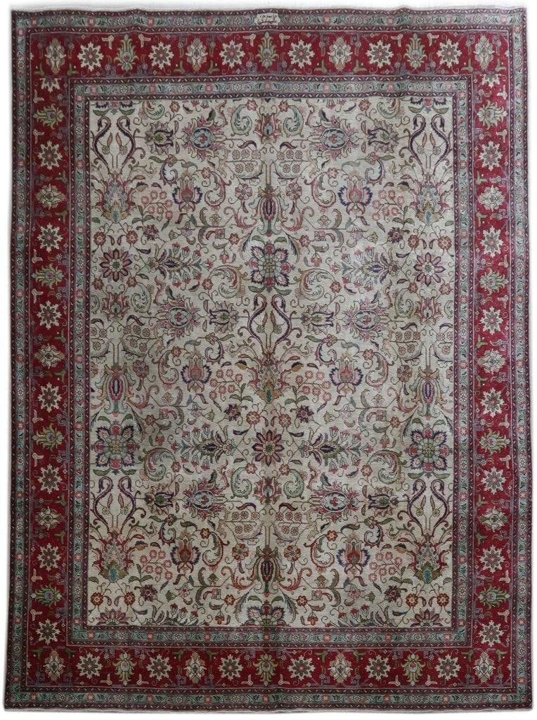 10 x 14 Handmade Vintage Persian Tabriz Signed Ivory Rug: 10 x 14 Handmade Vintage Persian Tabriz Signed Ivory Rug Free continental US Shipping This handmade vintage Persian Tabriz rug features an elegant ivory field adorned with intricate floral motifs and 