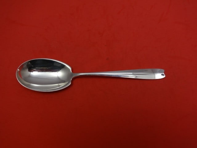 Tiffany & Co Cordis Sterling Silver Vintage Preserve Spoon 7 1/4": Tiffany & Co Cordis Sterling Silver Vintage Preserve Spoon 7 1/4" This exquisite serving spoon is a vintage piece from Tiffany & Co., featuring the elegant Cordis pattern. Crafted from high-quality st