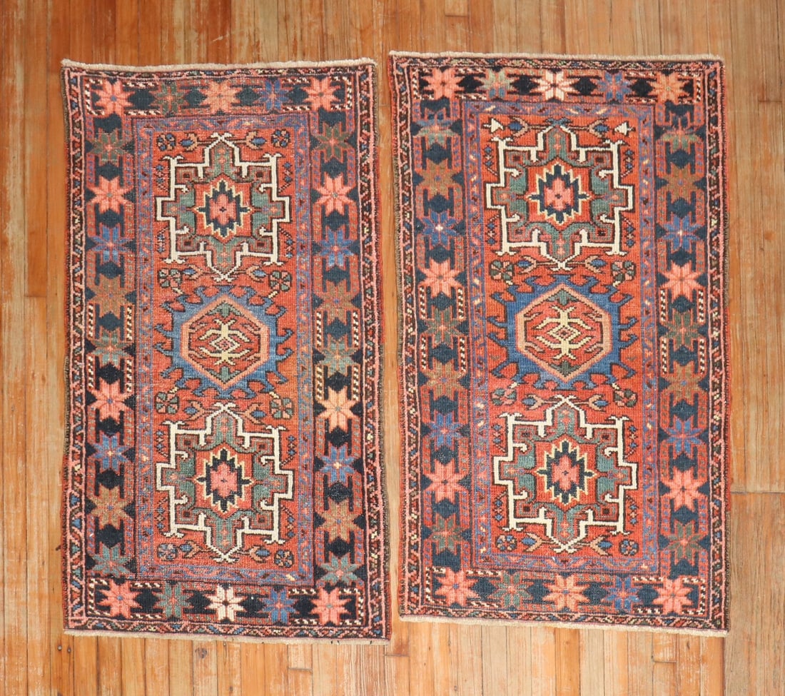 Pair of 1930s Persian Serapi Heriz Rugs 2' 7" x 4' 4": Pair of 1930s Persian Serapi Heriz Rugs 2' 7" x 4' 4" Pair of Persian Heriz rugs dating to the 1930s. This pre-owned pair is identified as Serapi/Heriz and features traditional geometric patterning. S