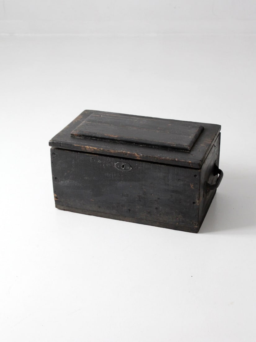 1940s Vintage Black Wooden Tool Box with Metal Handles: 1940s Vintage Black Wooden Tool Box with Metal Handles Explore this vintage wooden tool box from the 1940s, distinguished by its elegant black finish. It features sturdy metal handles and a hinged lid