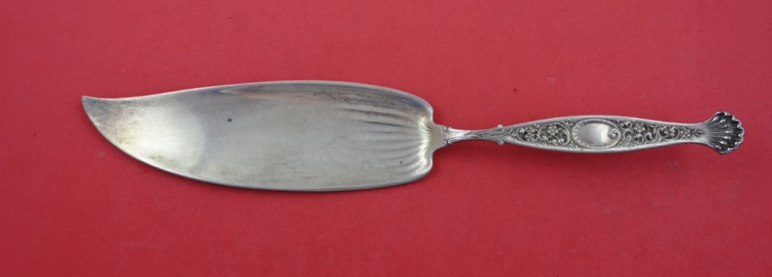 Whiting Hyperion Sterling Silver Trout Server 10 5/8": Whiting Hyperion Sterling Silver Trout Server 10 5/8" Presenting the Hyperion Trout Server from Whiting, expertly crafted in sterling silver. This elegant serving piece measures 10 5/8 inches and show
