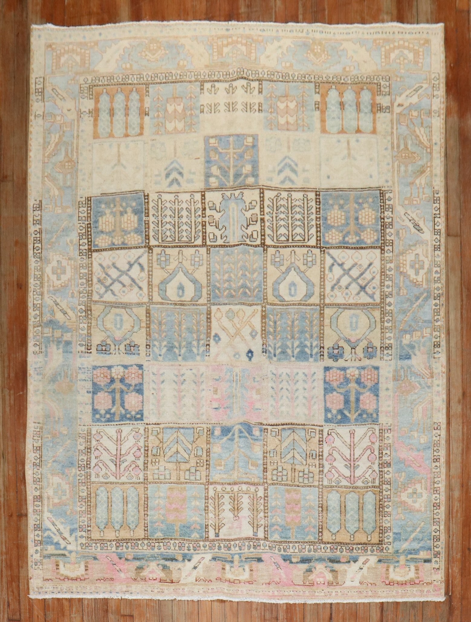 6' x 8' 4" Persian Bakhtiari Garden Design Rug: 6' x 8' 4" Persian Bakhtiari Garden Design Rug Vintage Persian Bakhtiari garden design rug from the 1940s in soft pastel tones. This pre-owned area rug features the classic Garden Box pattern associat