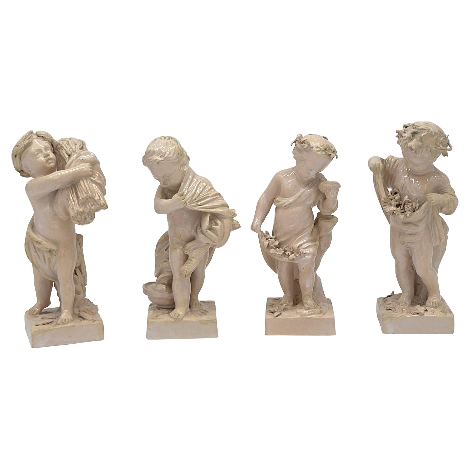 Sevres Creamware Neoclassical Figures Set of 4 by Bachelier: Sevres Creamware Neoclassical Figures Set of 4 by Bachelier This exquisite set of Sevres creamware figures, emblematic of the Four Seasons, showcases the artistry of Jean Bachelier, a prominent French