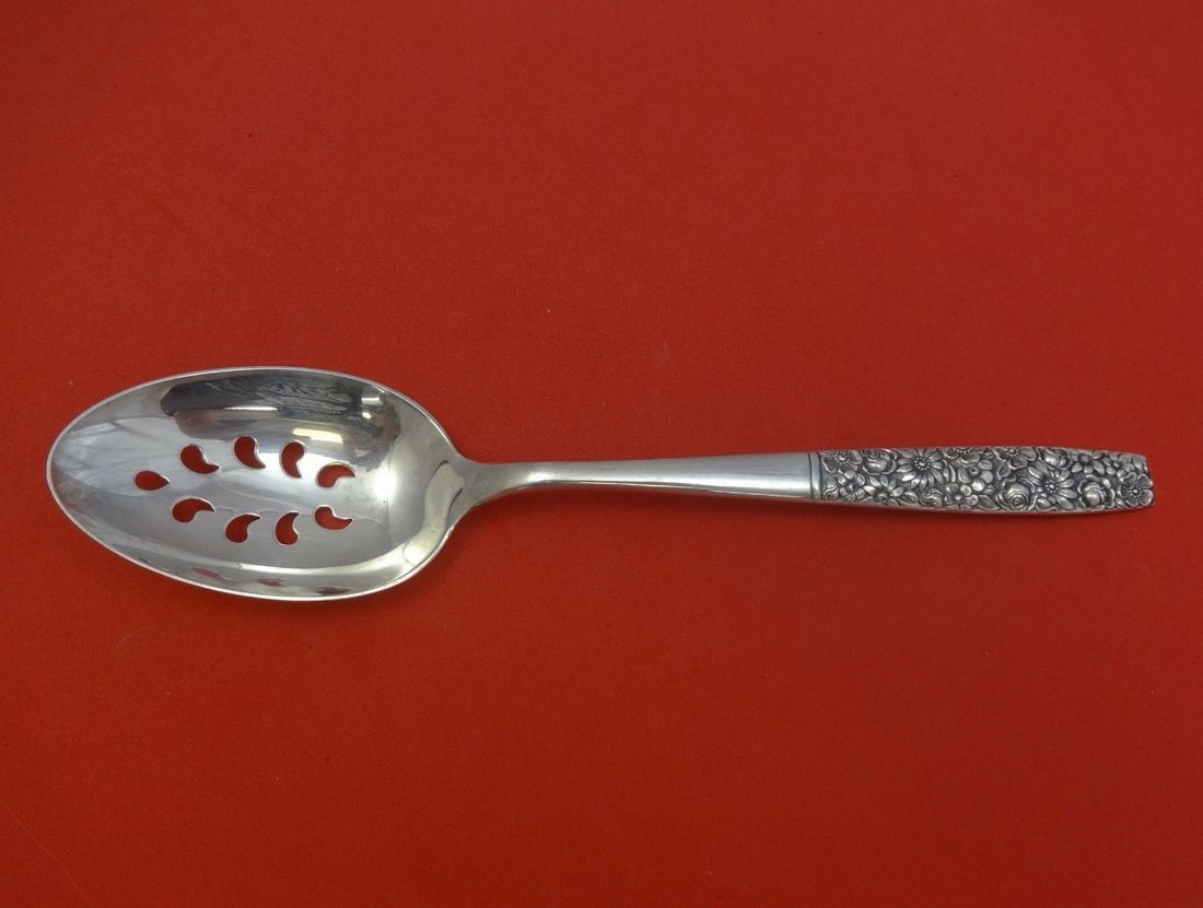 Towle Contessina sterling silver slotted serving spoon 9-hole 8 5/8": Towle Contessina sterling silver slotted serving spoon 9-hole 8 5/8" Sterling silver slotted serving spoon in the Contessina pattern by Towle. It is an original post-1940 piece made in the United Stat