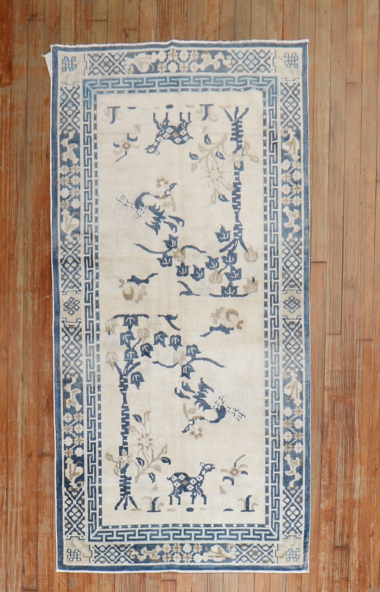 3' 1" x 5' 8" Chinese Peking Floral Rug in White and Soft Blue: 3' 1" x 5' 8" Chinese Peking Floral Rug in White and Soft Blue 20th century Chinese Floral Peking rug in white and soft blue. This pre-owned small rug features a floral design and is identified as a C