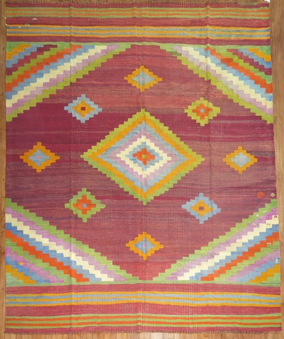 9' x 10' 11" Turkish Mid 20th Century Room Size Kilim: 9' x 10' 11" Turkish Mid 20th Century Room Size Kilim A colorful vintage Turkish kilim from the mid-20th century, designed in a room-size square format. This pre-owned rug offers the flatwoven charact