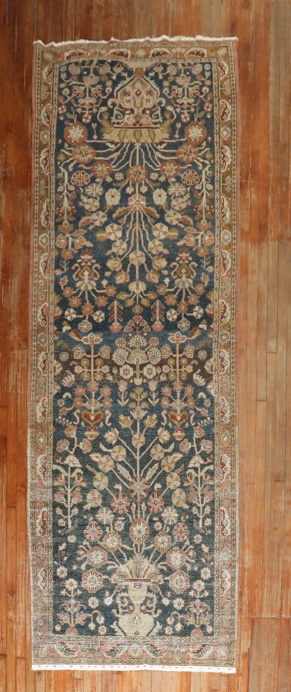 4' x 13' 7" Persian Malayer Gallery Runner 1920s: 4' x 13' 7" Persian Malayer Gallery Runner 1920s A 1920s Persian Malayer formal runner with a dark, moody palette and a worn pre-owned character. This gallery-size runner features the traditional Mala