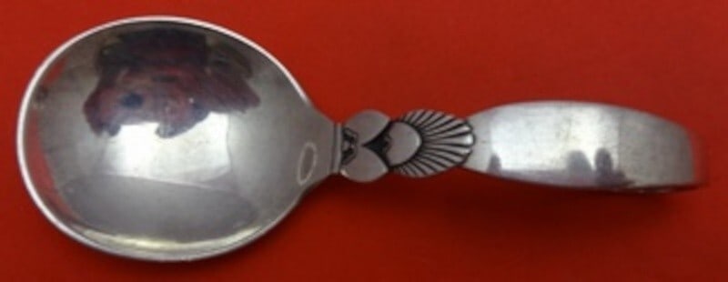 Georg Jensen Cactus Sterling Silver Baby Spoon Bent Handle 3 3/4": Georg Jensen Cactus Sterling Silver Baby Spoon Bent Handle 3 3/4" This exquisite baby spoon features the iconic Cactus pattern designed by renowned sculptor Gundolph Albertus in 1930. Crafted from hig