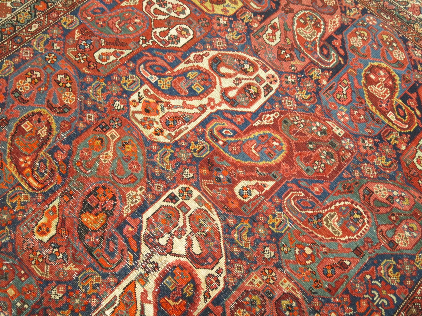 6' 5" x 15' 10" N.W. Persian Gallery Rug Spiraling Boteh: 6' 5" x 15' 10" N.W. Persian Gallery Rug Spiraling Boteh Large Northwest Persian gallery rug featuring a large-scale spiraling boteh design. This circa 1920 piece has age-related wear and is described