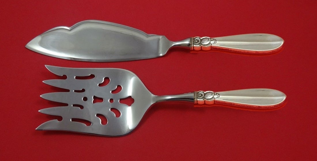 Frigast Princess Fuchsia Sterling Silver Fish Serving Set 2 Piece: Frigast Princess Fuchsia Sterling Silver Fish Serving Set 2 Piece Enhance your dining experience with the Princess Fuchsia Fish Serving Set by Frigast. This exquisite two-piece set, crafted from sterl