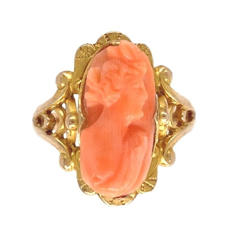 Unbranded Vintage 10k Yellow Gold Ring with Natural Coral Cameo Size 4.5: Unbranded Vintage 10k Yellow Gold Ring with Natural Coral Cameo Size 4.5 Vintage women's ring in 10k yellow gold featuring a genuine natural coral cameo with an oval shape. The piece is pre-owned and 