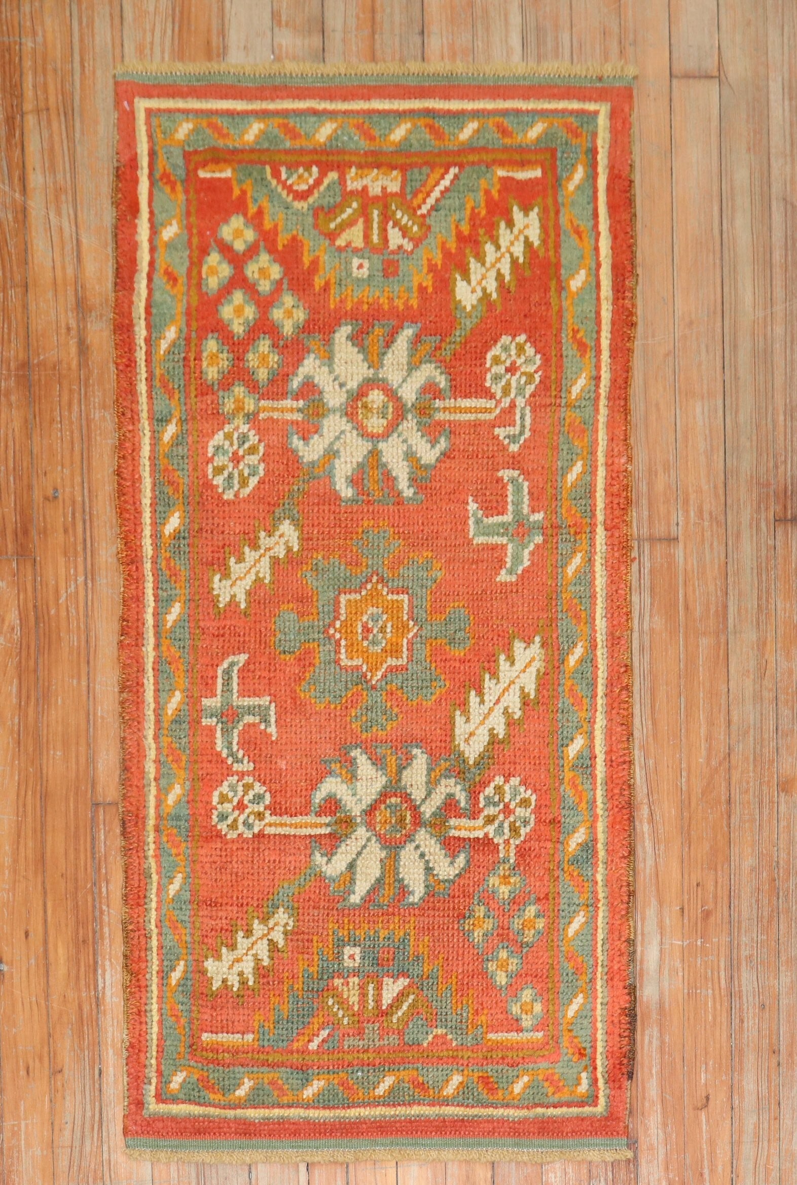 2' x 4' 1" Turkish Oushak Small Rug in Orange: 2' x 4' 1" Turkish Oushak Small Rug in Orange Early 20th century antique Turkish Oushak throw rug in a bright orange color. This small pre-owned rug features a woven geometric and floral design consis