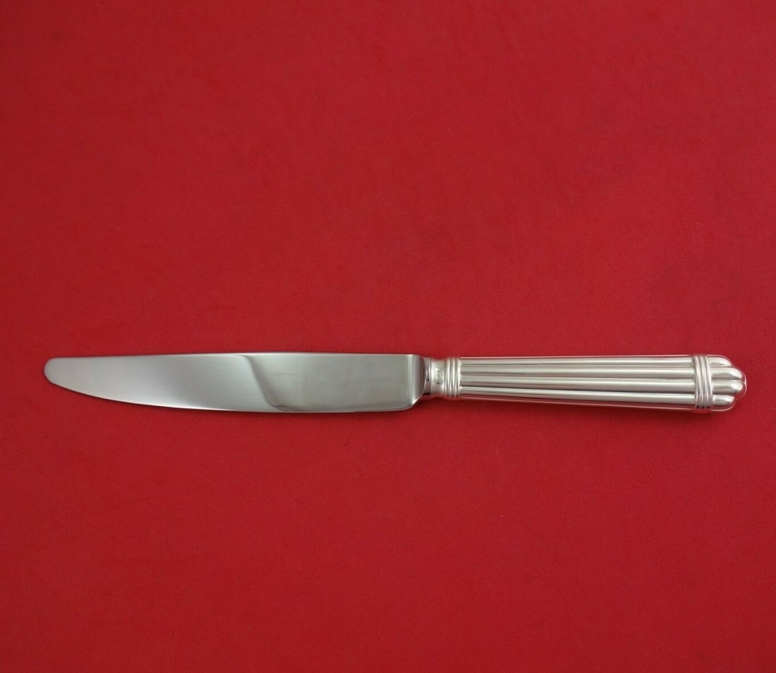 Christofle Aria Sterling Silver Dinner Knife 9 3/4" New Condition: Christofle Aria Sterling Silver Dinner Knife 9 3/4" New Condition This exquisite dinner knife from the Aria collection by Christofle features a hollow handle crafted from sterling silver, paired with 