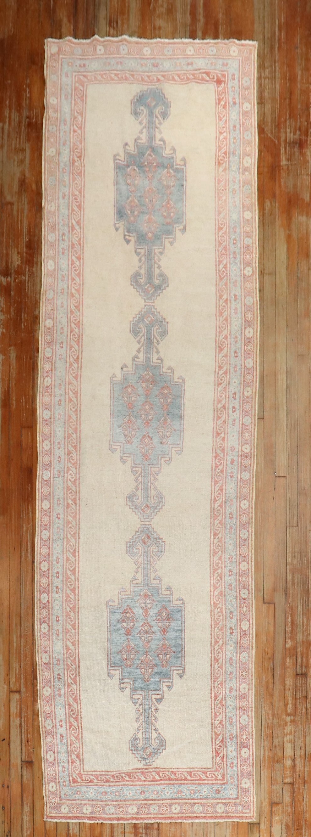 3' 8" x 13' Serab Northwest Persian Runner in Ivory: 3' 8" x 13' Serab Northwest Persian Runner in Ivory Vintage Northwest Persian Serab tribal runner from the 1920s with an ivory-toned field and traditional tribal design. This pre-owned rug is categori