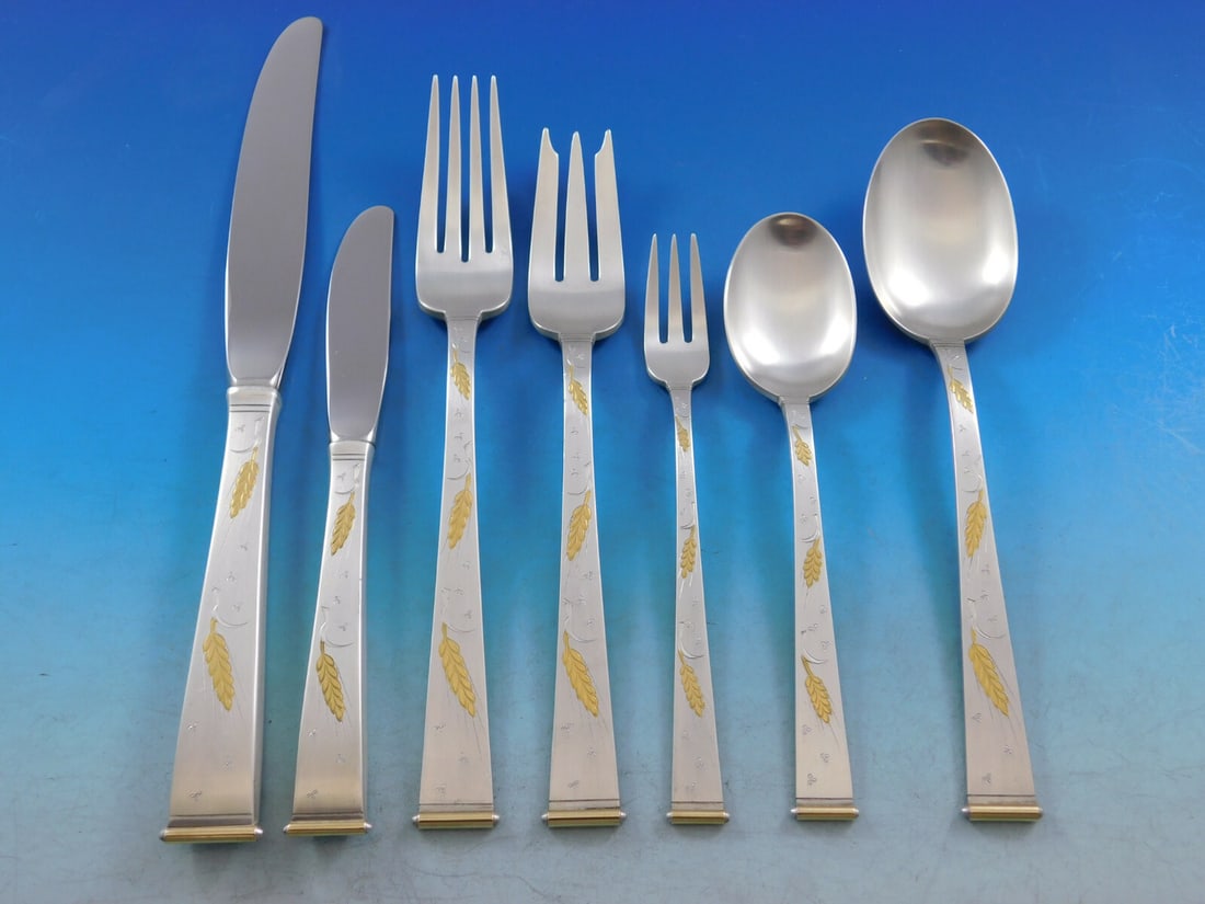 Gorham Golden Wheat Sterling Silver 97 Piece Flatware Set: Gorham Golden Wheat Sterling Silver 97 Piece Flatware Set This scarce Golden Wheat flatware set by Gorham features 97 pieces crafted in sterling silver, showcasing a Mid-Century Modern style. The set 