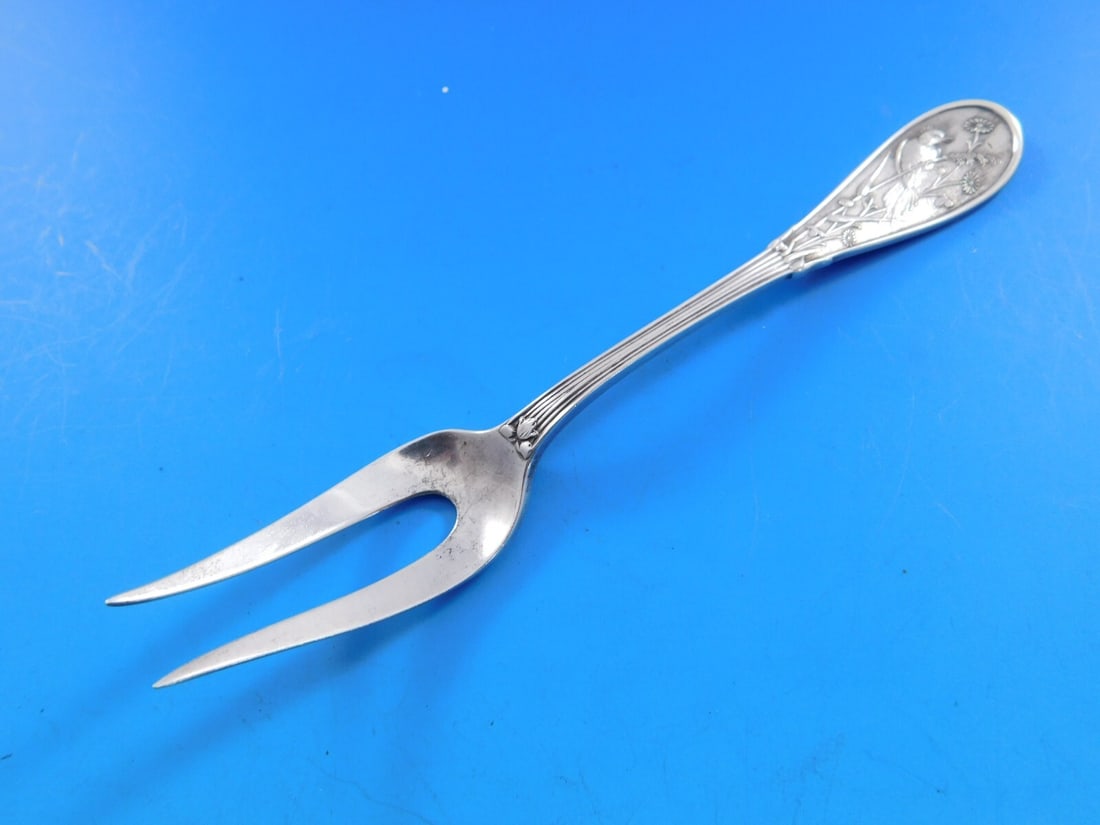 Tiffany & Co Japanese Sterling Silver 2-Tine Oyster Fork 4 7/8": Tiffany & Co Japanese Sterling Silver 2-Tine Oyster Fork 4 7/8" This exquisite Japanese by Tiffany and Co. oyster fork features a distinctive 2-tine design and measures 4 7/8 inches in length. Crafted