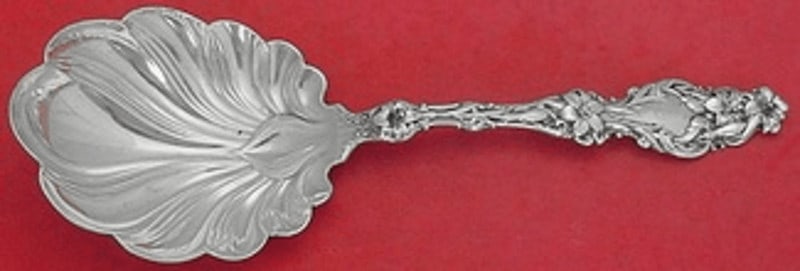 Whiting Lily Sterling Silver Berry Spoon 9 1/4 Inch Heirloom Serving: Whiting Lily Sterling Silver Berry Spoon 9 1/4 Inch Heirloom Serving This exquisite berry spoon from the Lily pattern by Whiting showcases the elegance of heirloom sterling silver craftsmanship. Measu