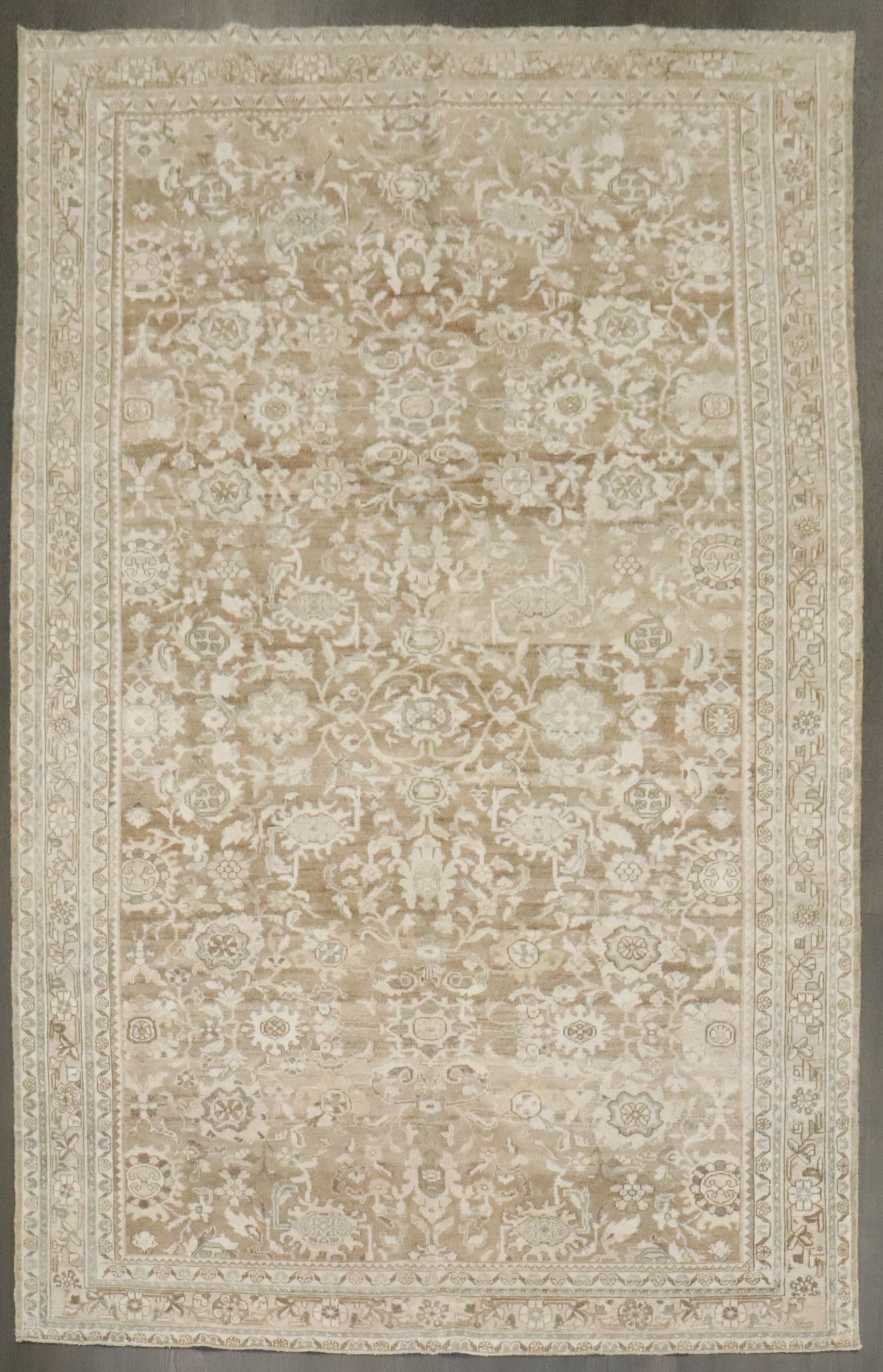 7' 2" x 10' 9" Persian Malayer room rug in brown cream: 7' 2" x 10' 9" Persian Malayer room rug in brown cream Early 20th century Persian Malayer rug in soft brown and cream with an intricate floral pattern. This pre-owned room-size rug offers a classic de