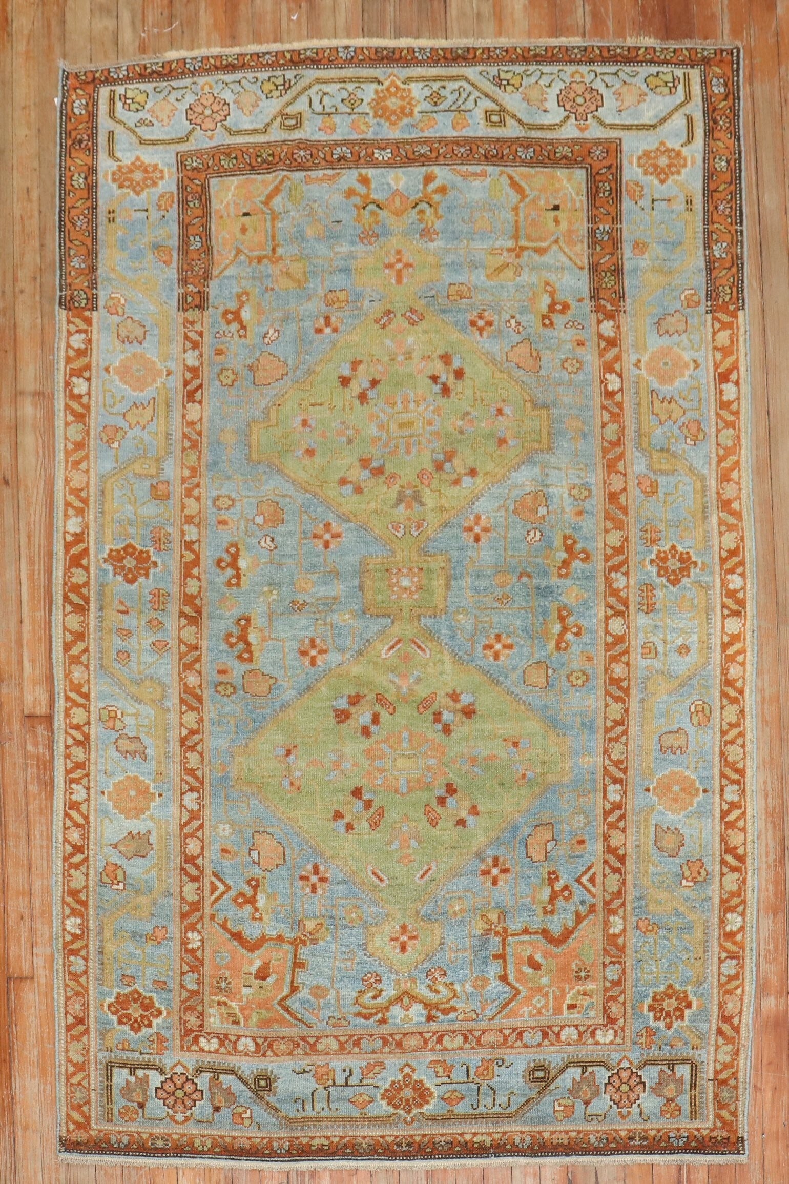 4' 9" x 7' Northwest Persian Rug in Blue and Green: 4' 9" x 7' Northwest Persian Rug in Blue and Green Colorful Northwest Persian intermediate rug from the 1920s, featuring vivid blue and green tones. This pre-owned piece offers classic Persian charact