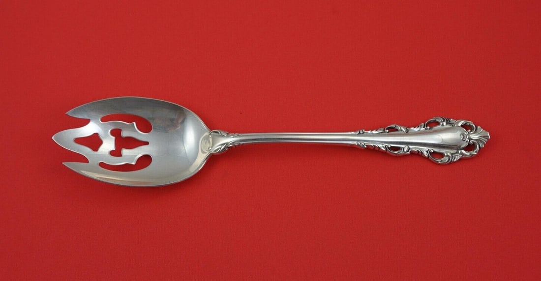 Lunt Sterling Silver Dresden Scroll Pierced Serving Spoon 8.5": Lunt Sterling Silver Dresden Scroll Pierced Serving Spoon 8.5" This stunning serving spoon features the elegant Dresden Scroll pattern by Lunt, crafted from high-quality sterling silver. With an origi