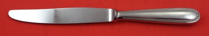 Christofle Perles sterling silver dinner knife 9 3/4": Christofle Perles sterling silver dinner knife 9 3/4" Sterling silver dinner knife in the Perles pattern by Christofle. This vintage pre-owned piece is not monogrammed and is in excellent condition. M