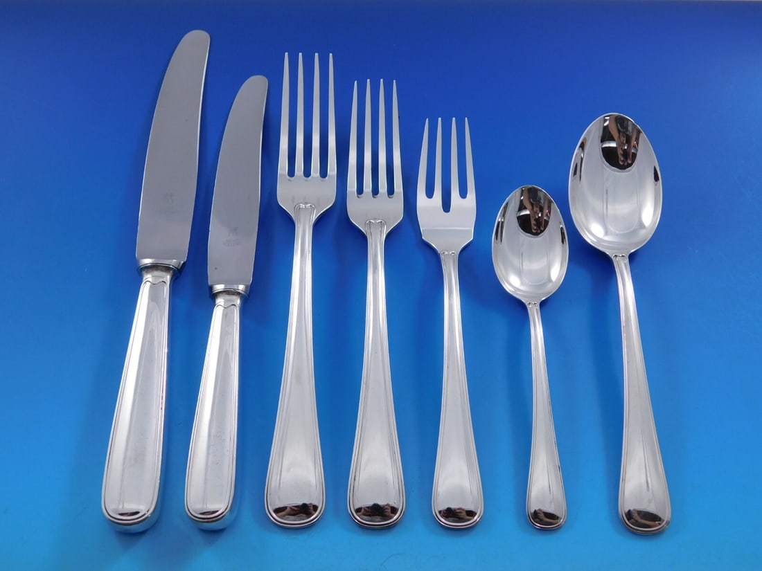 Buccellati Old Italian Sterling Silver 88 Piece Flatware Set: Buccellati Old Italian Sterling Silver 88 Piece Flatware Set This Buccellati Old Italian sterling silver flatware set from Italy features timeless fluid lines and a mirror finish, crafted using tradit