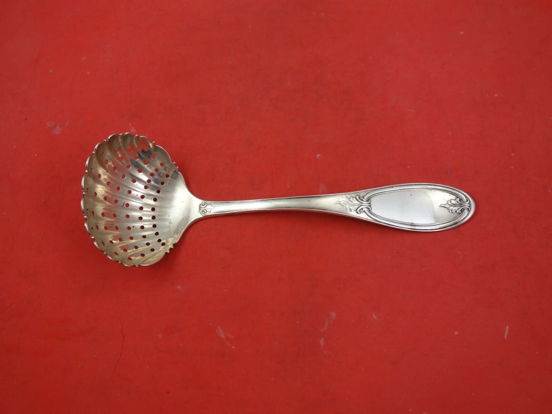 Sterling Silver Olive Pattern Sugar Sifter Ladle by John Polhamus 8": Sterling Silver Olive Pattern Sugar Sifter Ladle by John Polhamus 8" This exquisite 8" coin silver sugar sifter ladle, crafted by John Polhamus for Robert Rait & Co., showcases the elegant Olive patte