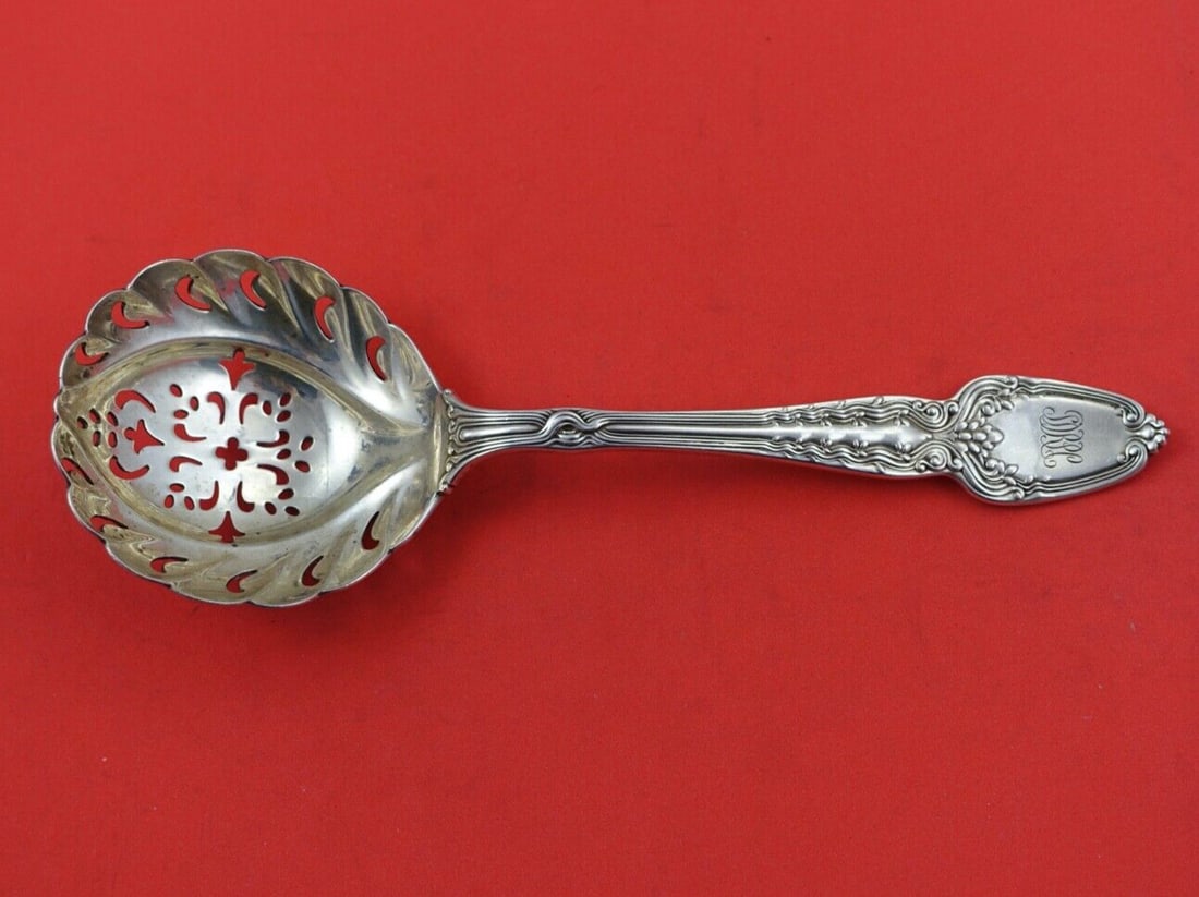 Tiffany & Co. Broom Corn Sterling Silver Sugar Sifter 7": Tiffany & Co. Broom Corn Sterling Silver Sugar Sifter 7" This exquisite 7" sterling silver sugar sifter from Tiffany & Co. features the elegant Broom Corn pattern, a classic design that reflects the a