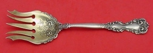 International Sterling Silver Revere Sardine Fork Gold Washed 5-Tine 5 7/8": International Sterling Silver Revere Sardine Fork Gold Washed 5-Tine 5 7/8" This elegant sardine fork showcases the Revere pattern by International, crafted from high-quality sterling silver with a lu