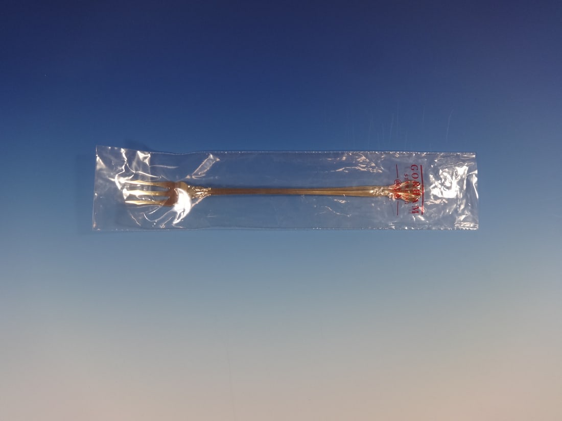 Gorham Chantilly Vermeil Sterling Silver Pickle Fork 8 1/4": Gorham Chantilly Vermeil Sterling Silver Pickle Fork 8 1/4" This exquisite serving fork is crafted in the Chantilly Vermeil pattern by Gorham, showcasing the brand's renowned quality and elegance. Mad