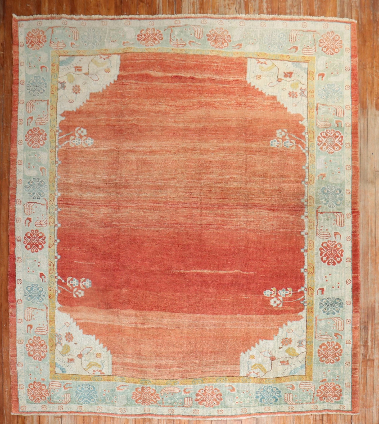 8' 10" x 10' Early 20th Century Turkish Oushak Room Rug: 8' 10" x 10' Early 20th Century Turkish Oushak Room Rug Early 20th century Turkish Oushak rug in a tomato red colorway. This pre-owned room-size square rug offers the classic Oushak style noted in the