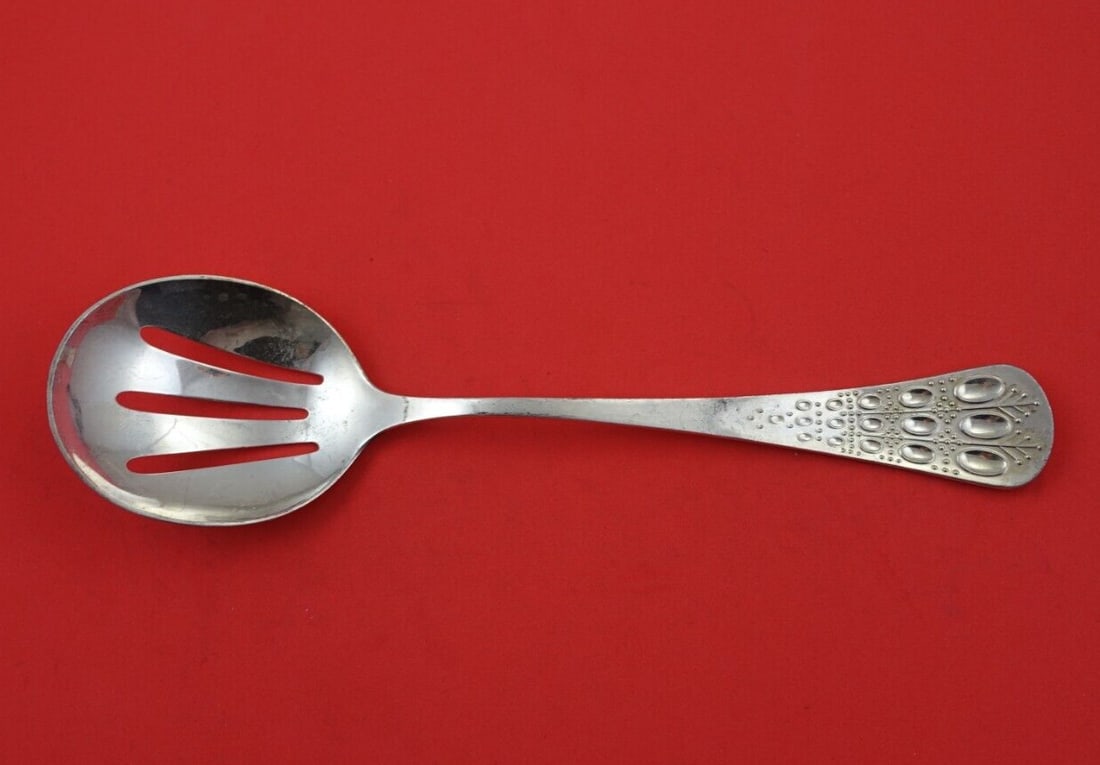 Rosenthal Romance Sterling Silver 9 1/8 Inch Ice Spoon: Rosenthal Romance Sterling Silver 9 1/8 Inch Ice Spoon This exquisite ice spoon from the Romance pattern by Rosenthal is crafted from high-quality sterling silver. Measuring 9 1/8 inches, this slotted