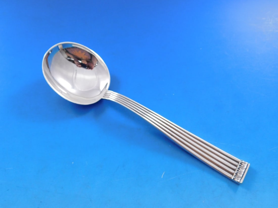 Buccellati Rigato Sterling Silver Cream Soup Spoon 6.5 Inch: Buccellati Rigato Sterling Silver Cream Soup Spoon 6.5 Inch This exquisite cream soup spoon, crafted by Buccellati, features the elegant Rigato pattern. Made from high-quality sterling silver, this pi
