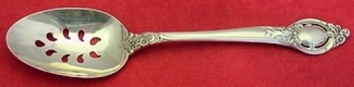 Reed & Barton Cameo Sterling Silver Slotted Serving Spoon 8.5": Reed & Barton Cameo Sterling Silver Slotted Serving Spoon 8.5" This exquisite serving spoon features a slotted design and is crafted from high-quality sterling silver. The spoon is part of the Cameo p