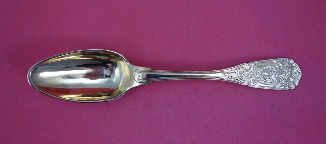 German Sterling Vermeil Dinner Spoon with Fruit 8: German Sterling Vermeil Dinner Spoon with Fruit 8 This German sterling dinner spoon features a vermeil finish and an ornate hand-chased design with fruit motifs. Crafted by various makers, it includes