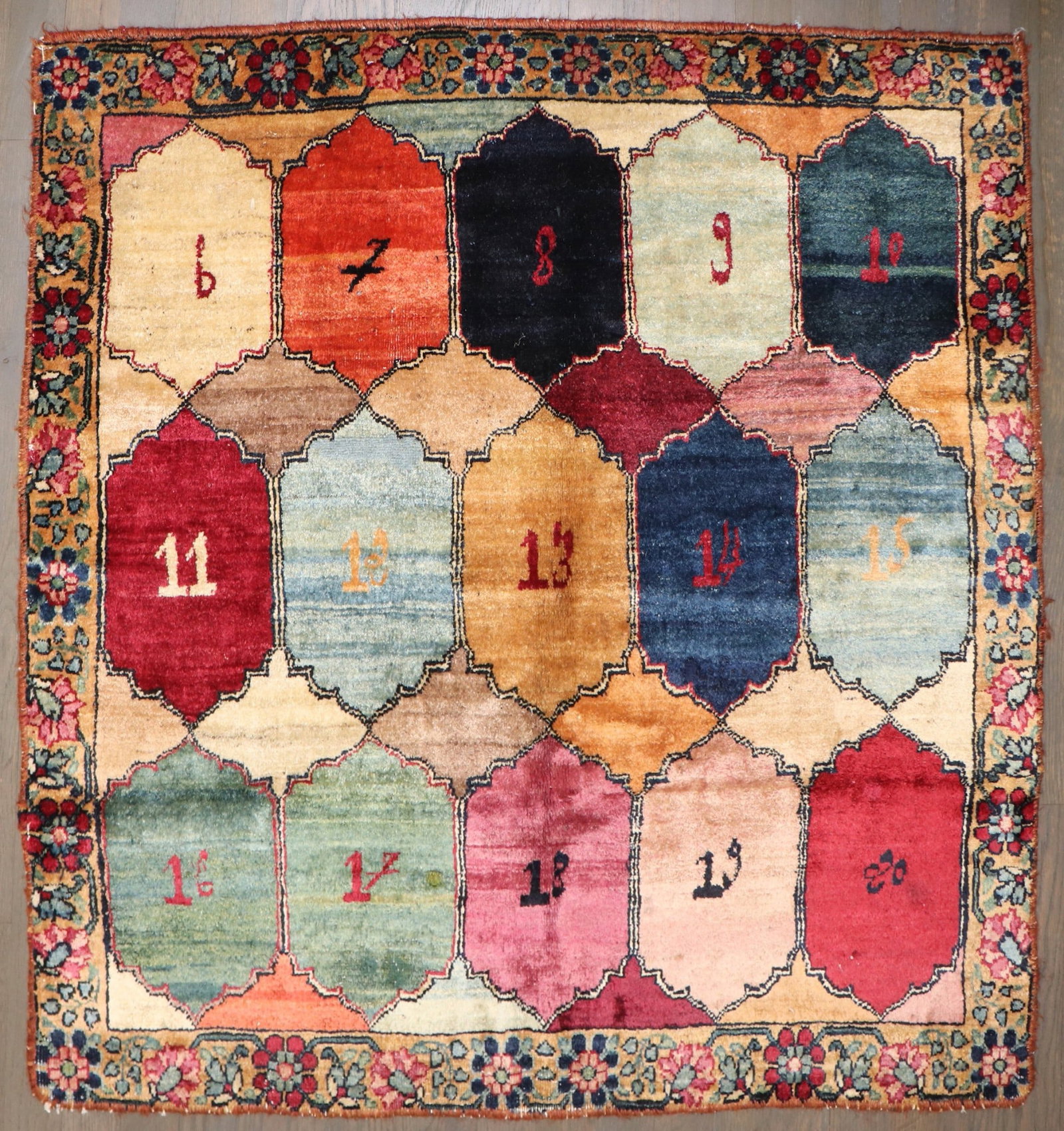 3' 3" x 3' 4" Square Persian Kerman Rug Numbered Diamond Design: 3' 3" x 3' 4" Square Persian Kerman Rug Numbered Diamond Design Early 20th-century Persian Kerman rug with a distinctive square format and an unusual numerical design. The field is arranged in a grid 