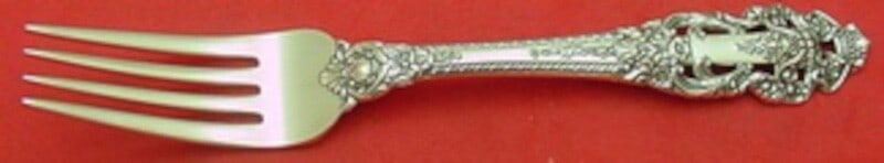 Gorham Crown Baroque Sterling Silver Dinner Fork 7 3/4": Gorham Crown Baroque Sterling Silver Dinner Fork 7 3/4" Elevate your dining experience with this exquisite Crown Baroque dinner fork by Gorham. Crafted from high-quality sterling silver, this fork mea