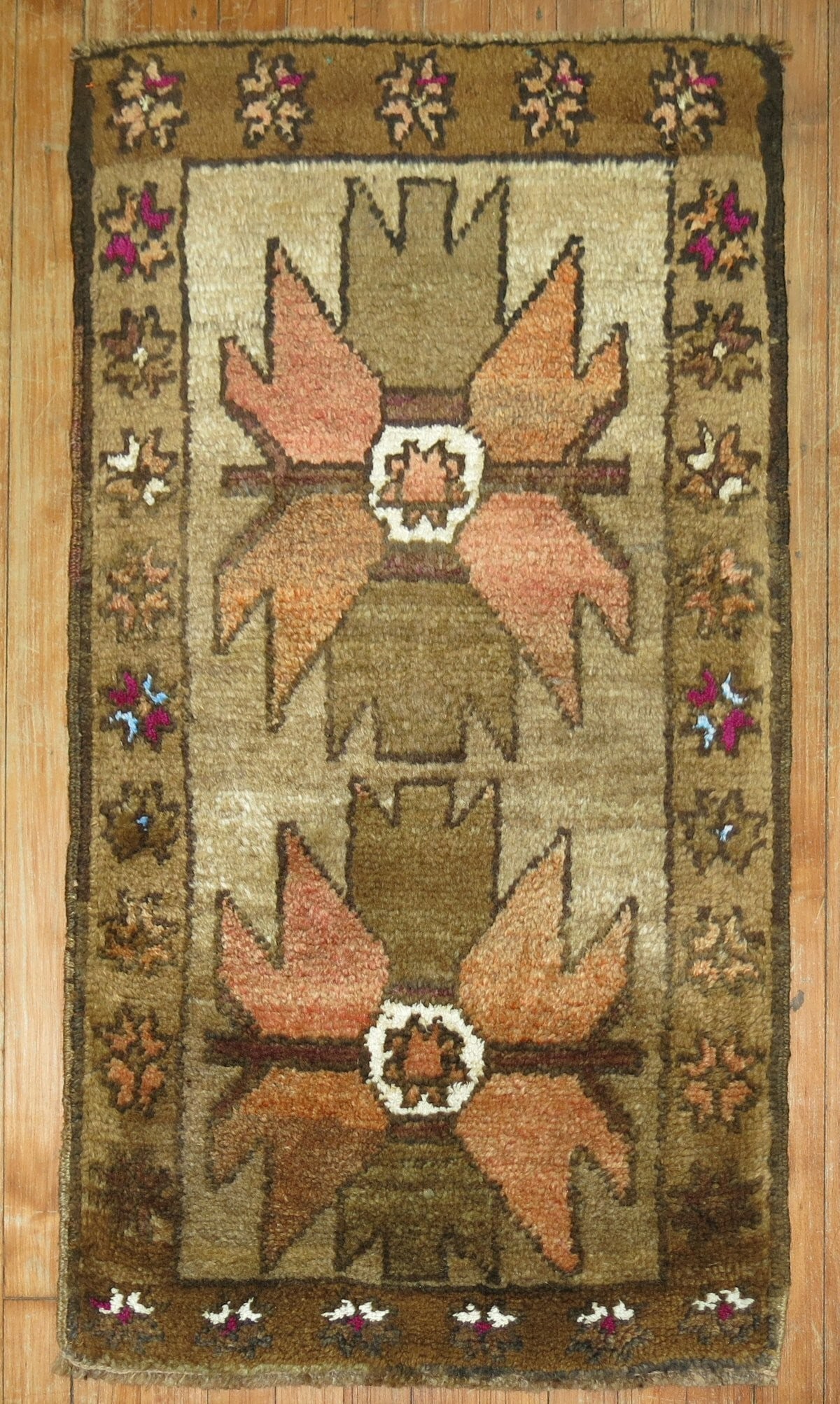 2' x 3' 6" Vintage Kars Village Rug: 2' x 3' 6" Vintage Kars Village Rug Vintage Kars village rug from the 3rd quarter of the 20th century. This small rectangular rug features a floral design and is offered in pre-owned condition. Specif