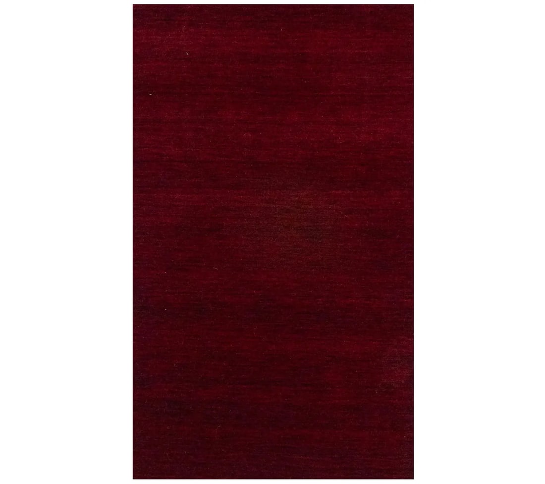 Maroon Red Hand-Loomed Wool Gabbeh 3x5 Rug Modern Design: Maroon Red Hand-Loomed Wool Gabbeh 3x5 Rug Modern Design Enhance your living space with this Maroon Red Solid Design Hand-Loomed Gabbeh Wool Rug. Measuring 2'11 x 4'11, this exquisite area rug showcas