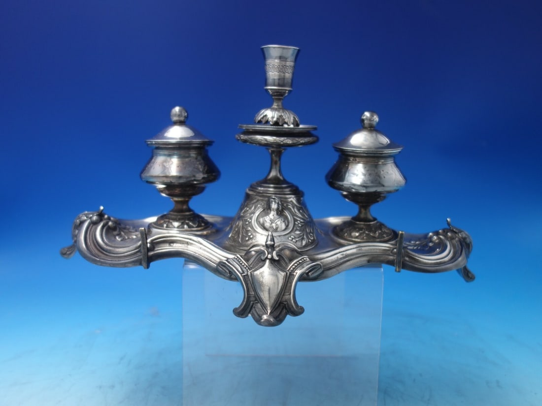 Circa 1840 Coin Silver Inkwell with Woman Bust & Acanthus Leaves: Circa 1840 Coin Silver Inkwell with Woman Bust & Acanthus Leaves This exquisite coin silver double inkwell, dating back to circa 1840, showcases a beautifully crafted bust of a woman surrounded by ele