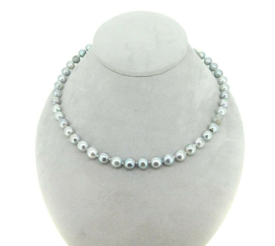Authentic 8.5mm Blue Akoya Pearl Necklace 14k White Gold Clasp: Authentic 8.5mm Blue Akoya Pearl Necklace 14k White Gold Clasp This exquisite necklace features a stunning strand of blue Akoya cultured pearls, measuring 8-8.5mm in diameter. The pearls are semi-roun