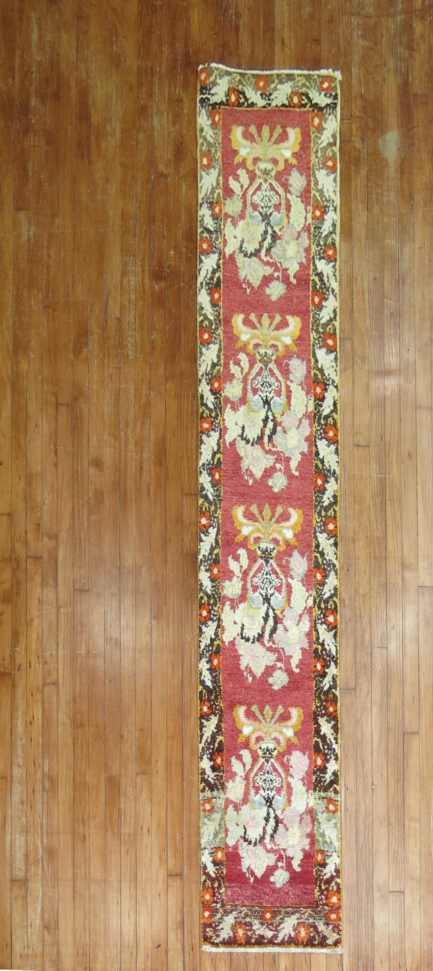 1' 9" x 9' 10" Turkish Karabagh Floral Runner: 1' 9" x 9' 10" Turkish Karabagh Floral Runner Mid-20th century Turkish floral runner derived from floral Russian Karabagh rugs. This pre-owned runner features a long, narrow format and a floral design